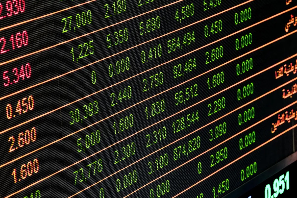 An electronic board of exchange rates and prices in red and green digits